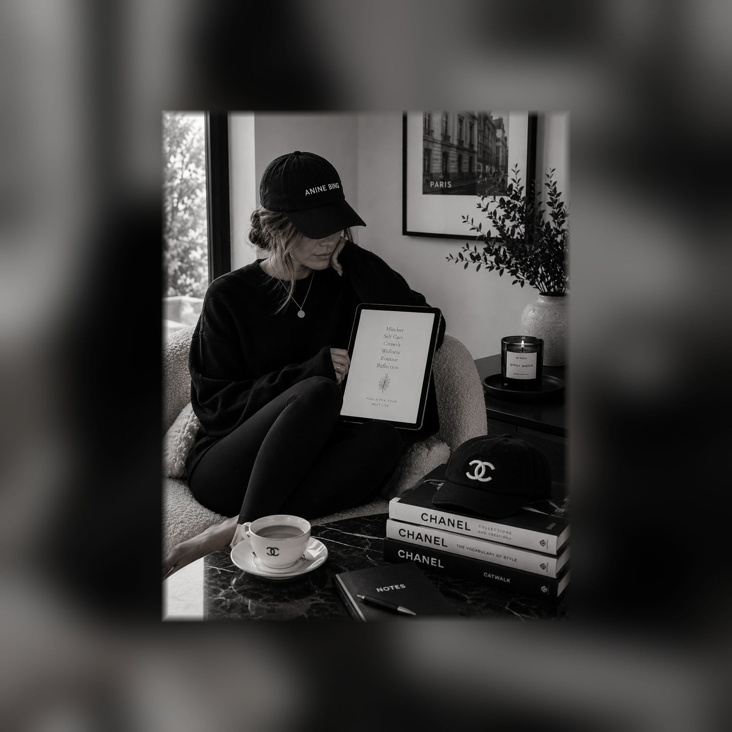 The Wellness Bundle guides on a tablet — black and white lifestyle mockup 1, full-bleed square