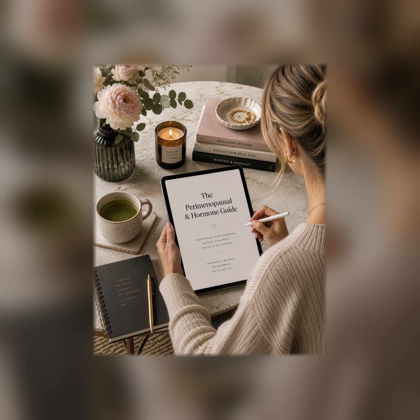 The Perimenopause & Hormone Guide on a tablet — black and white lifestyle mockup, full-bleed square