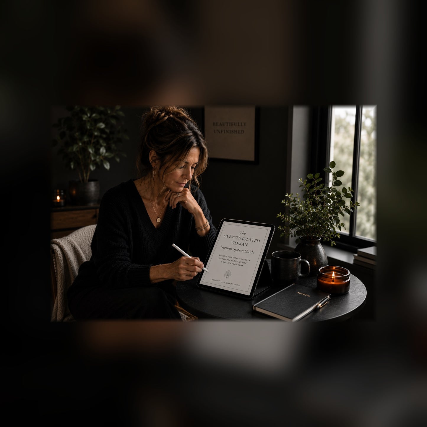 The Overstimulated Woman nervous system guide on a tablet — black and white lifestyle mockup 2, full-bleed square
