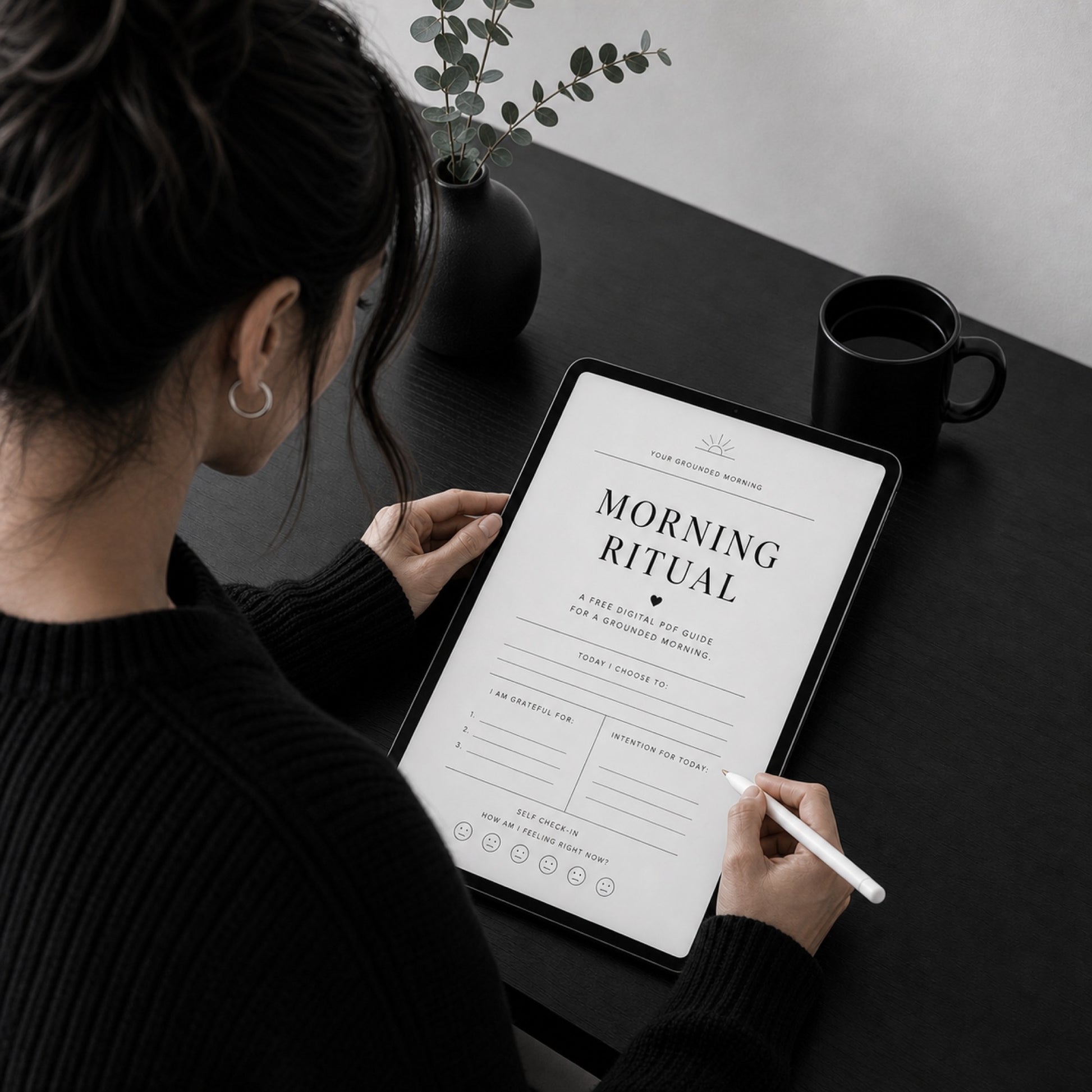 Free Morning Ritual 16-page guide with gratitude and intention prompts on a tablet — desk scene