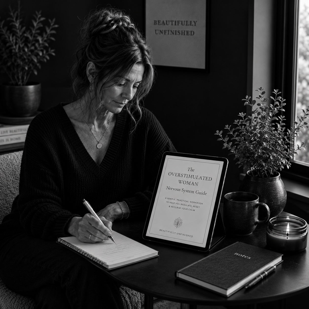The Overstimulated Woman complete nervous system guide — calm desk scene with candle