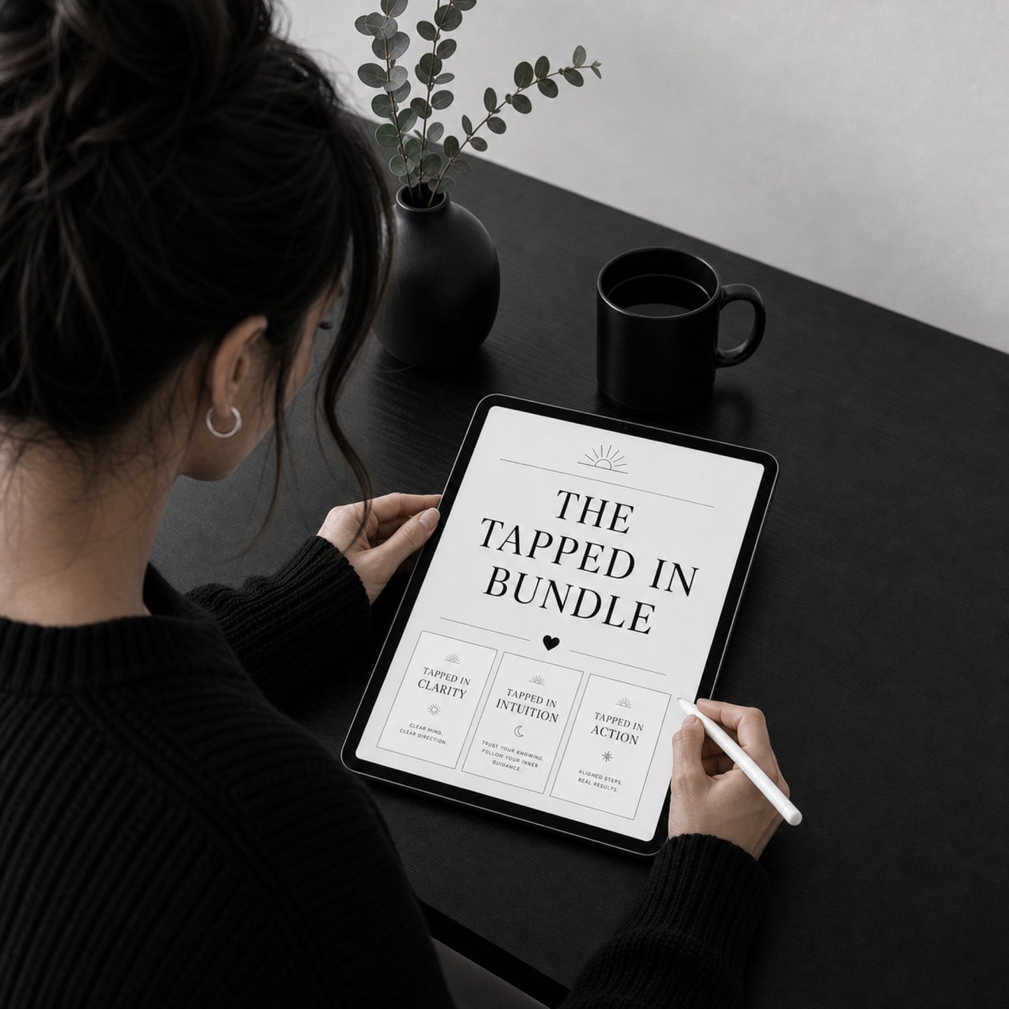 The Tapped In Bundle EFT tapping guide and practice pages on a tablet — dark desk scene