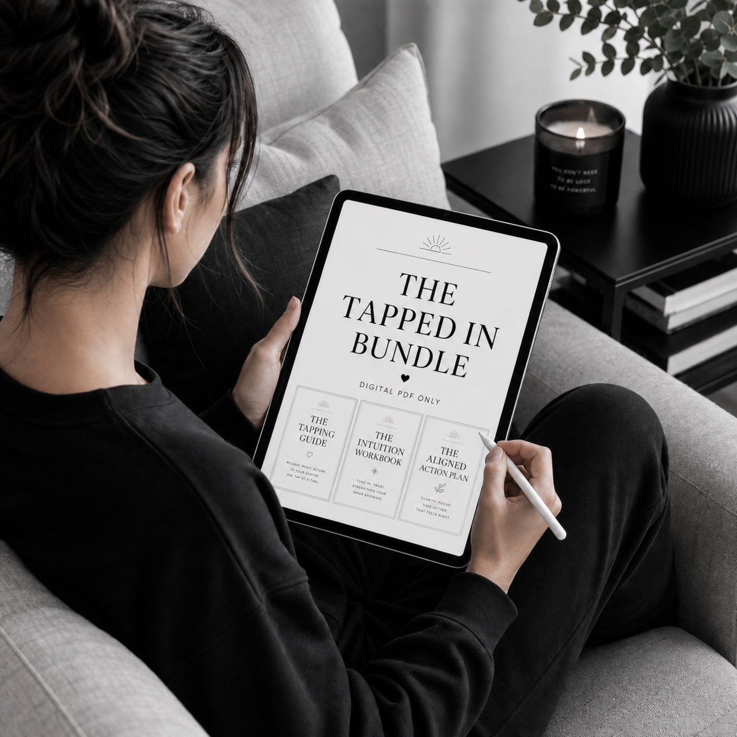 Woman reading The Tapped In Bundle clarity, intuition and action set — sofa lifestyle mockup