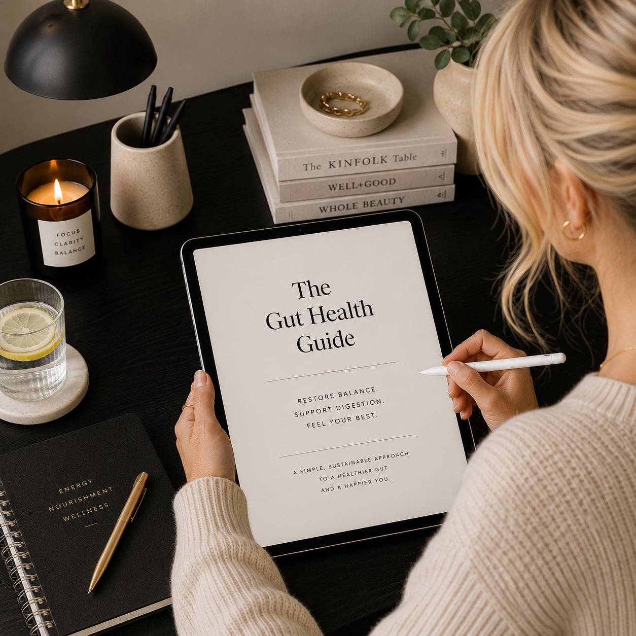 Woman reading The Gut Health Guide bloating and hormone support PDF — monochrome mockup 2